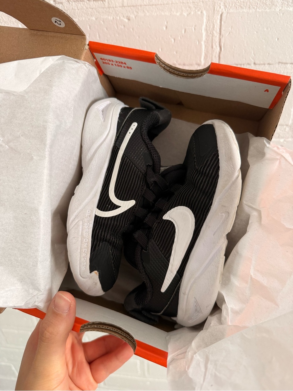 Nike Kids' slip-on Black/White Athletic Sneakers